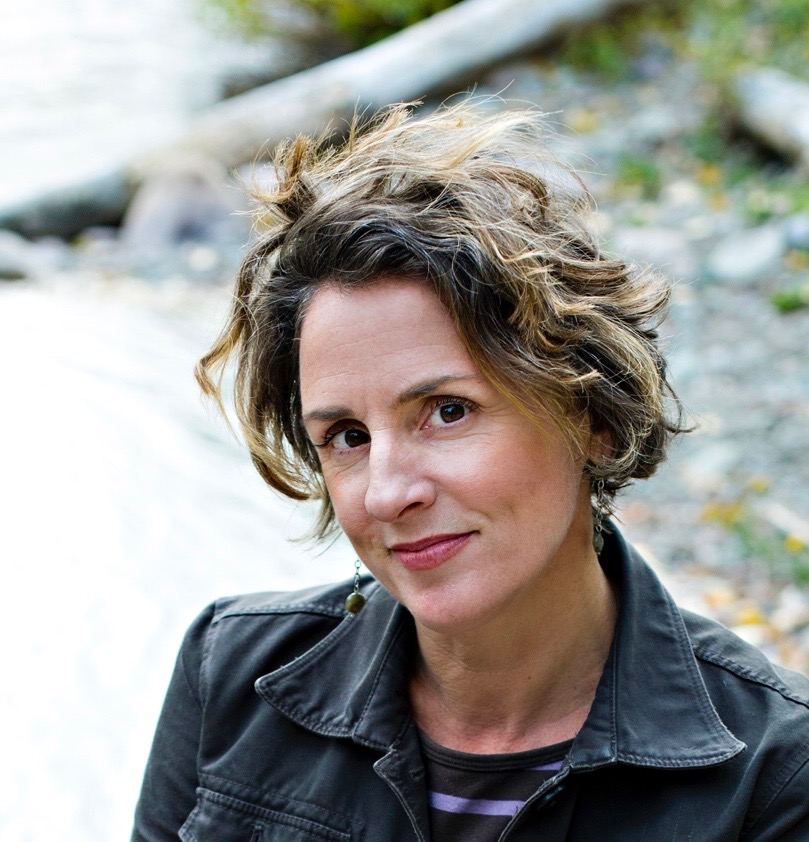 Karla Theilen posing for the camera, wearing a dark colored jacket