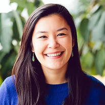 Kira Liu smiling in a blue shirt