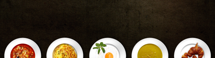 Five white plates full of healthy foods against a dark background